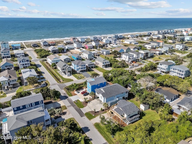bird's eye view featuring a water view and a residential view