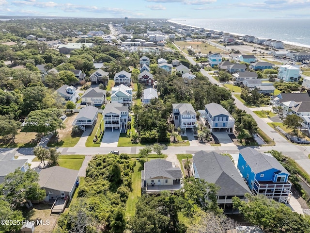 bird's eye view with a residential view and a water view