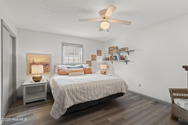 116 SE 8th St, Oak Island, NC 28465 - bedroom featuring wood finished floors, baseboards, and ceiling fan