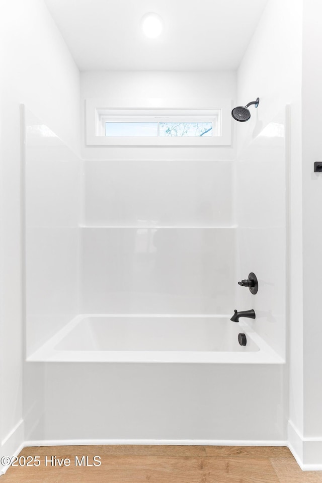322 NE 50th St, Oak Island, NC 28465 - full bath with shower / bathtub combination and baseboards