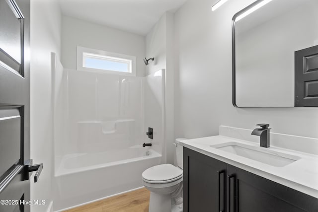 149 Pelican Pointe Dr, Elizabeth City, NC 27909 - full bathroom featuring vanity, toilet, wood finished floors, and bathtub / shower combination