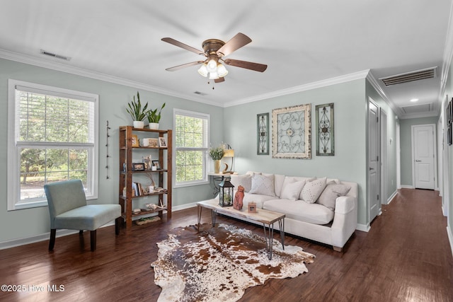 living area featuring baseboards, a ceiling fan, dark wood finished floors, and visible vents