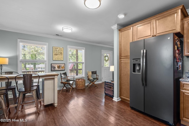 kitchen with stainless steel fridge, baseboards, crown molding, and dark wood-type flooring