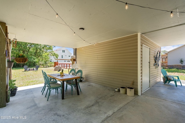 view of patio with outdoor dining area