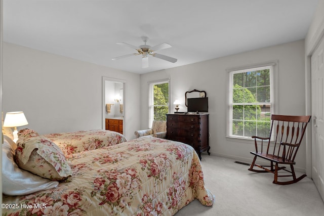 bedroom with carpet flooring, baseboards, and a ceiling fan