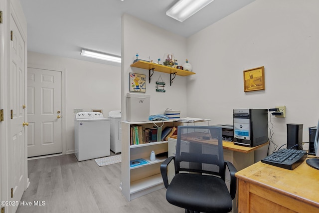 office with separate washer and dryer and light wood-style floors