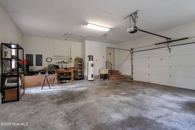 garage with electric water heater, electric panel, a garage door opener, and a workshop area