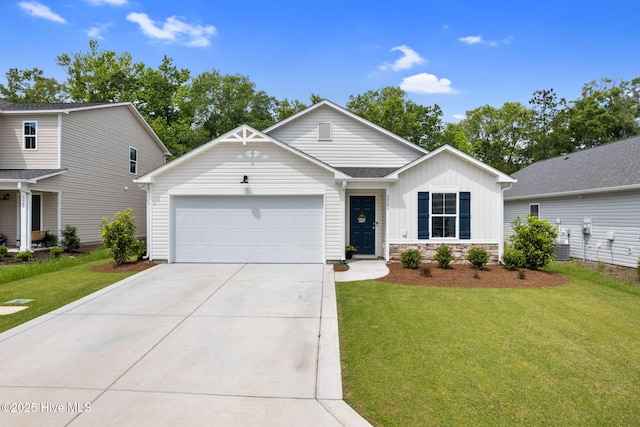 ranch-style house with board and batten siding, driveway, a front yard, and a garage