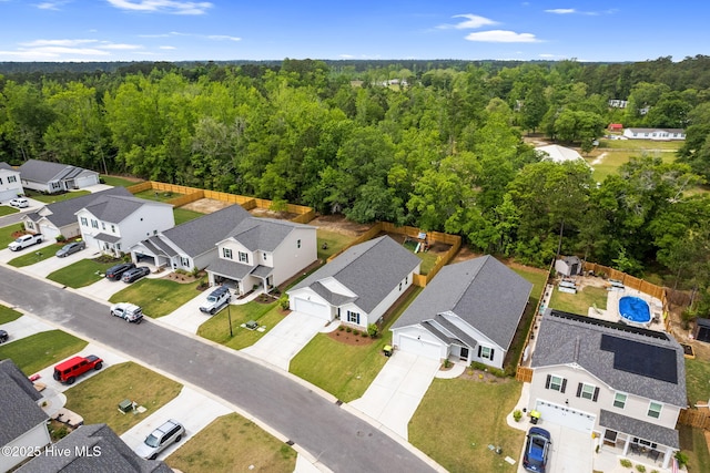 aerial view with a view of trees and a residential view
