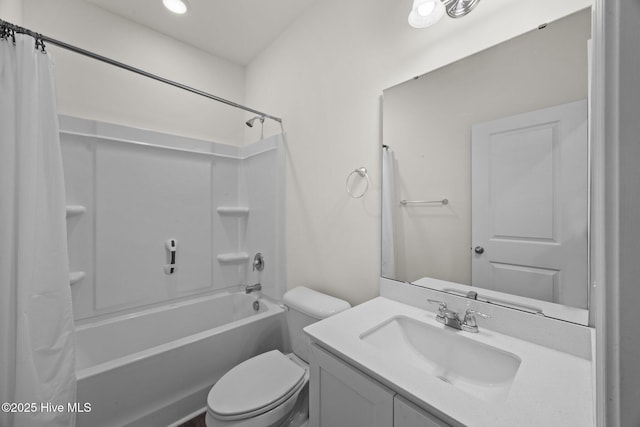 bathroom with vanity, toilet, and shower / bath combination with curtain