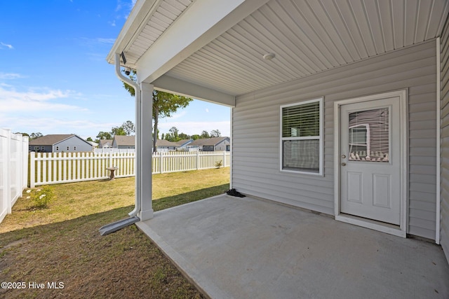 view of patio / terrace with a residential view and a fenced backyard