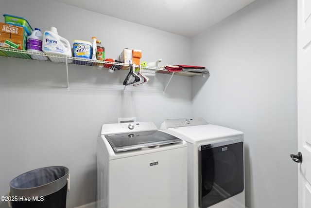 743 Heather Glen Ln, Calabash, NC 28467 - laundry area with washing machine and clothes dryer, laundry area, and baseboards