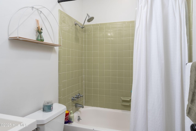 full bath featuring toilet and shower / bath combination with curtain