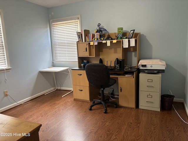 office area featuring baseboards and light wood-style floors