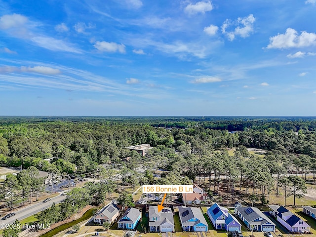 bird's eye view with a view of trees