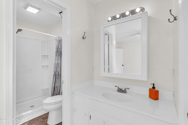 full bathroom with visible vents, vanity, toilet, and a shower stall