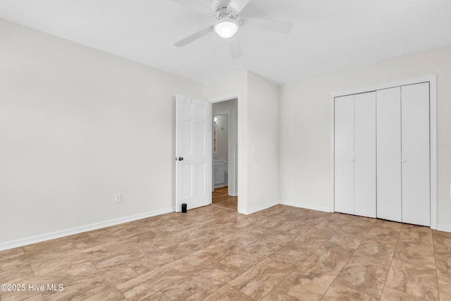 unfurnished bedroom with ceiling fan, baseboards, and a closet