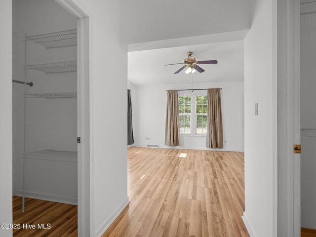 305 Cottontail Run, Newport, NC 28570 - hall with visible vents, light wood finished floors, and baseboards