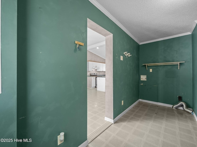 305 Cottontail Run, Newport, NC 28570 - laundry area with tile patterned floors, baseboards, ornamental molding, and a textured ceiling