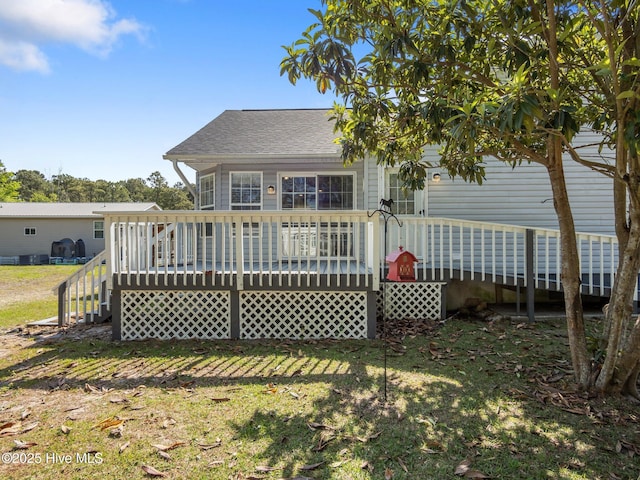 305 Cottontail Run, Newport, NC 28570 - rear view of house with a shingled roof, a yard, and a deck