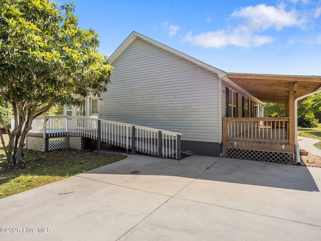 305 Cottontail Run, Newport, NC 28570 - view of home's exterior with a wooden deck