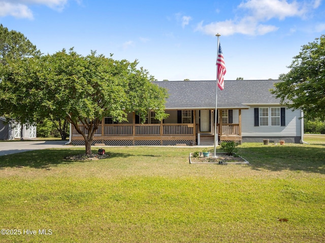 305 Cottontail Run, Newport, NC 28570 - single story home with a porch, roof with shingles, and a front yard
