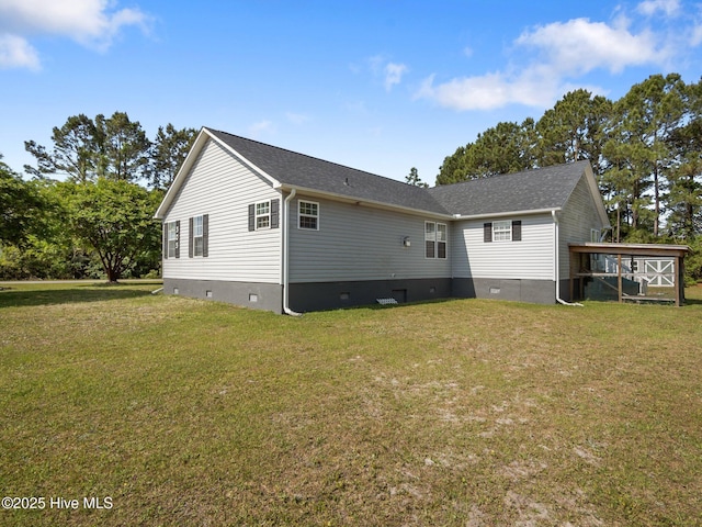 305 Cottontail Run, Newport, NC 28570 - rear view of house featuring a lawn, crawl space, and roof with shingles