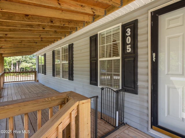 305 Cottontail Run, Newport, NC 28570 - wooden terrace featuring a porch