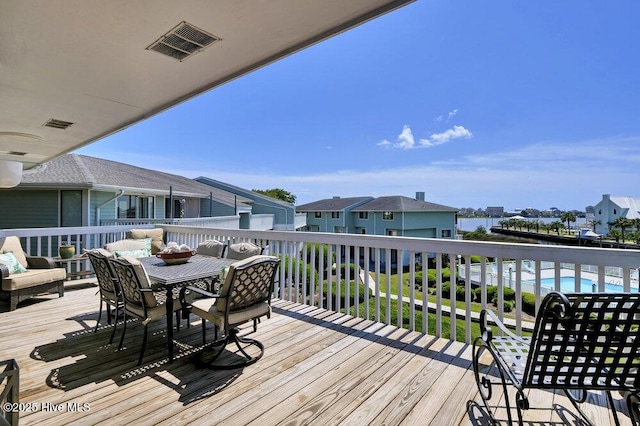 109 Teakwood Dr Unit 802, Carolina Beach, NC 28428 - deck with outdoor dining area