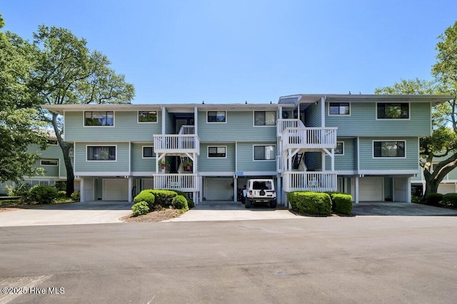 109 Teakwood Dr Unit 802, Carolina Beach, NC 28428 - view of property with a garage and driveway