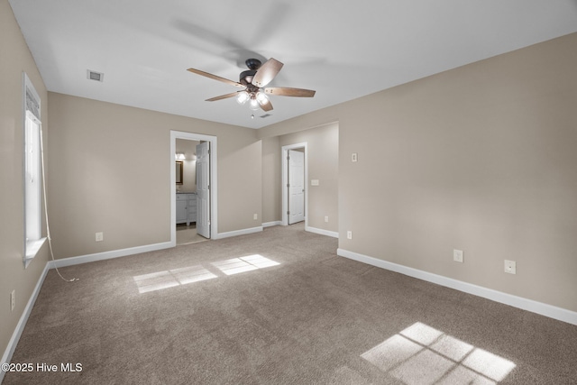 308 E Ashe St, Burgaw, NC 28425 - unfurnished bedroom featuring carpet flooring, visible vents, and baseboards