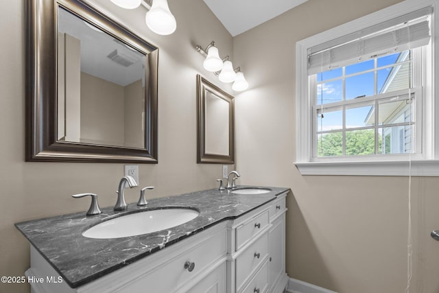308 E Ashe St, Burgaw, NC 28425 - full bath featuring double vanity, visible vents, baseboards, and a sink