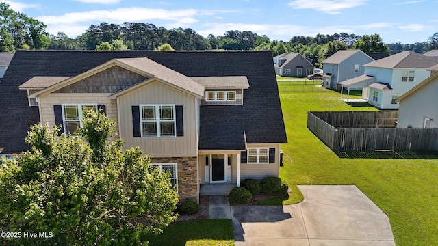2202 Sweet Bay Dr Unit B, Greenville, NC 27834 - view of front of property with stone siding, a shingled roof, a residential view, and board and batten siding