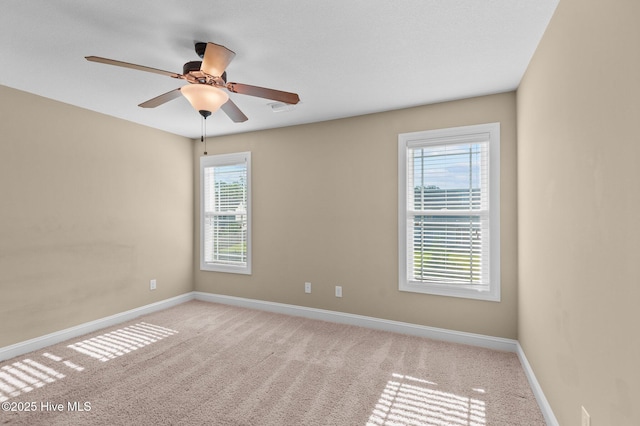 2202 Sweet Bay Dr Unit B, Greenville, NC 27834 - empty room featuring baseboards, carpet floors, and a ceiling fan