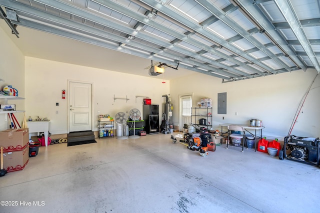 garage with a garage door opener and electric panel