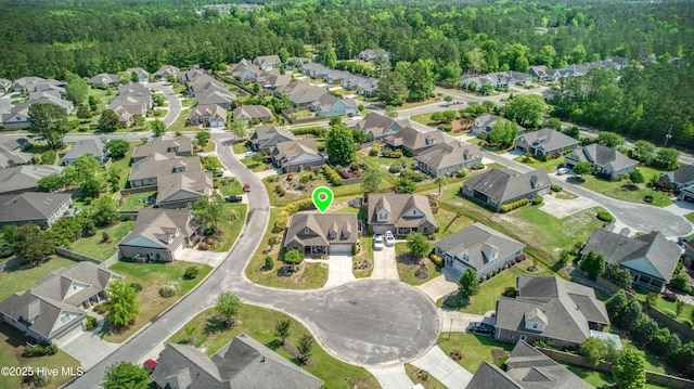 bird's eye view with a residential view and a forest view