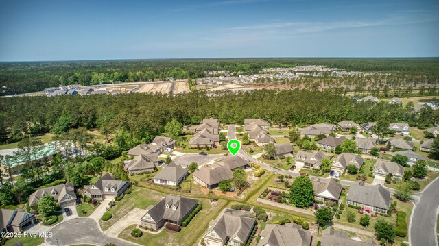 bird's eye view with a view of trees and a residential view
