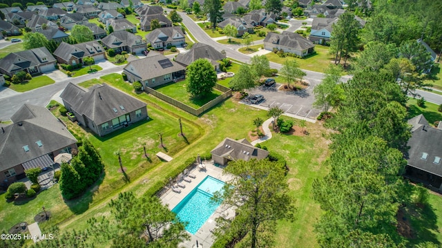 birds eye view of property with a residential view