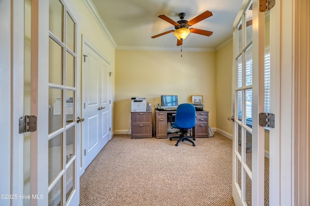 office area with baseboards, ornamental molding, french doors, and light carpet