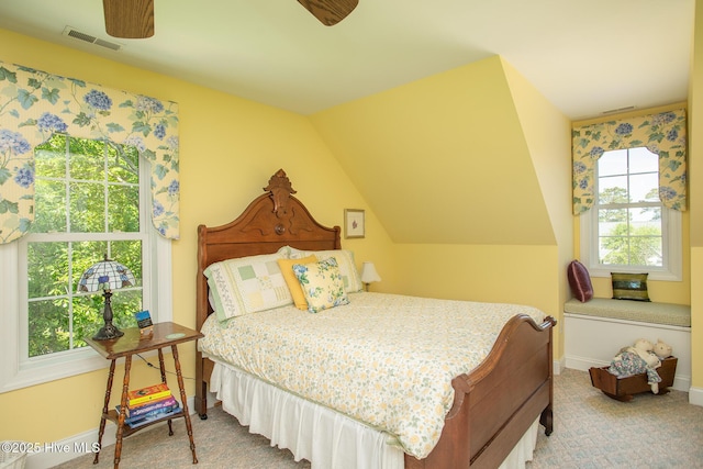 bedroom with baseboards, carpet flooring, and visible vents