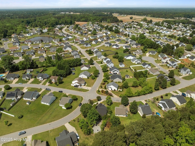 aerial view with a residential view and a water view