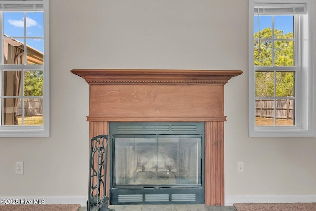 189 Queens Haven Rd, Hubert, NC 28539 - interior details with baseboards and a glass covered fireplace