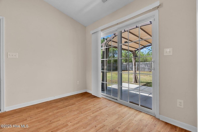 189 Queens Haven Rd, Hubert, NC 28539 - entryway featuring vaulted ceiling, baseboards, and light wood-type flooring