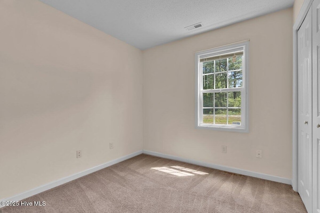 189 Queens Haven Rd, Hubert, NC 28539 - carpeted empty room with baseboards and visible vents