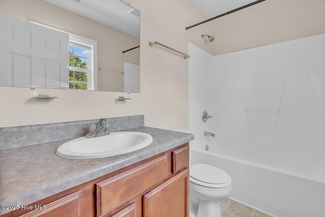 189 Queens Haven Rd, Hubert, NC 28539 - bathroom with vanity, toilet, washtub / shower combination, and tile patterned floors
