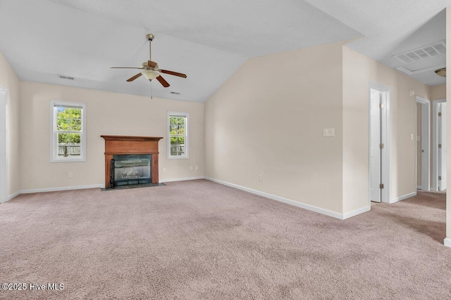 189 Queens Haven Rd, Hubert, NC 28539 - unfurnished living room with ceiling fan, carpet flooring, visible vents, and plenty of natural light