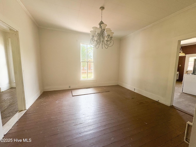 311 W Jones St, Trenton, NC 28585 - spare room featuring crown molding, a chandelier, and hardwood / wood-style flooring