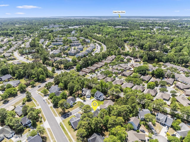 birds eye view of property with a residential view