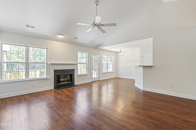 4109 Kettering Pl, Wilmington, NC 28412 - unfurnished living room featuring a fireplace with flush hearth, ceiling fan, wood finished floors, a chandelier, and baseboards