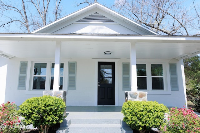 property entrance with a porch